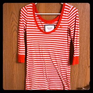 Orange and white striped Abercrombie shirt.
